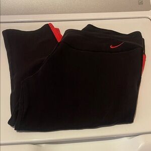 Nike Black Capri Leggings with pink Swoosh Accent